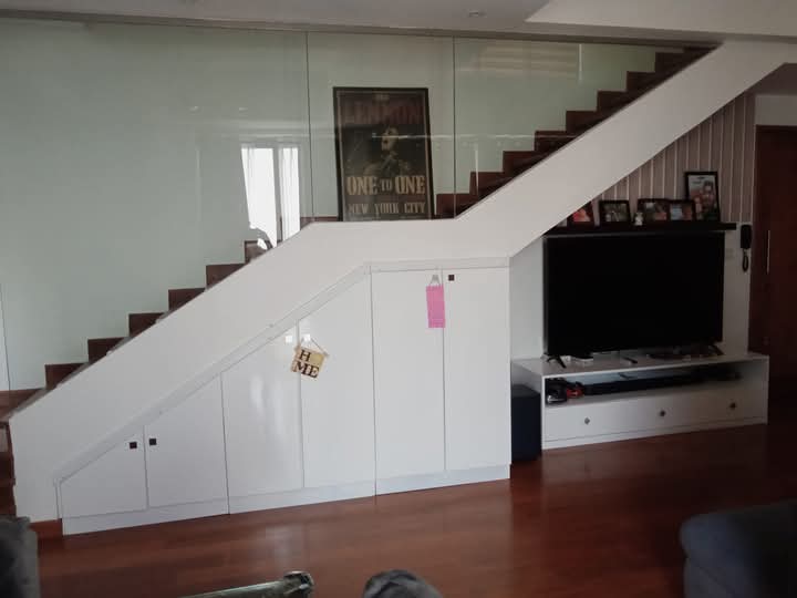Under stair cabinet and TV area after renovation