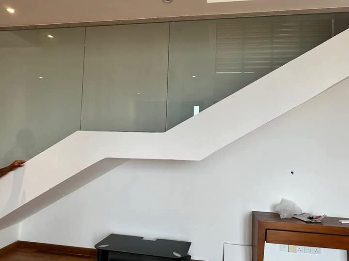 Under stair cabinet and TV area before renovation