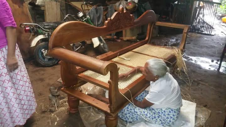 Cane settee fully finished with cushions