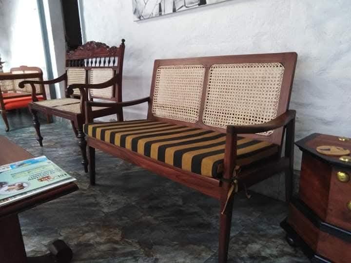 Two-seater cane sofa before seat cushion